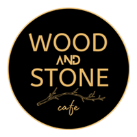 Black circle with Wood and Stone cafe written in gold